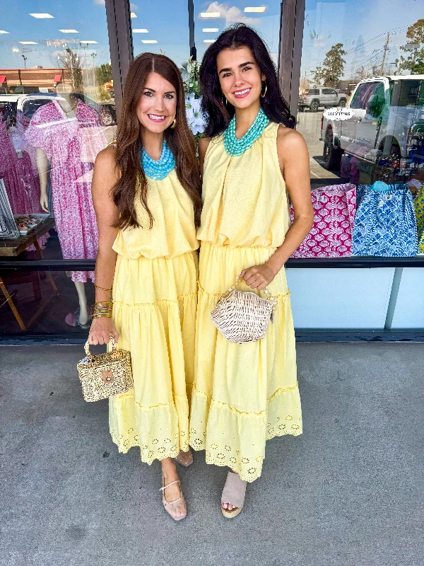Eyelet Skirt: Yellow a-line skirt cut